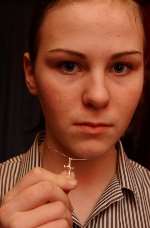 SAMANTHA DEVINE: asked to remove the necklace and crucifix last week. Picture: BARRY CRAYFORD