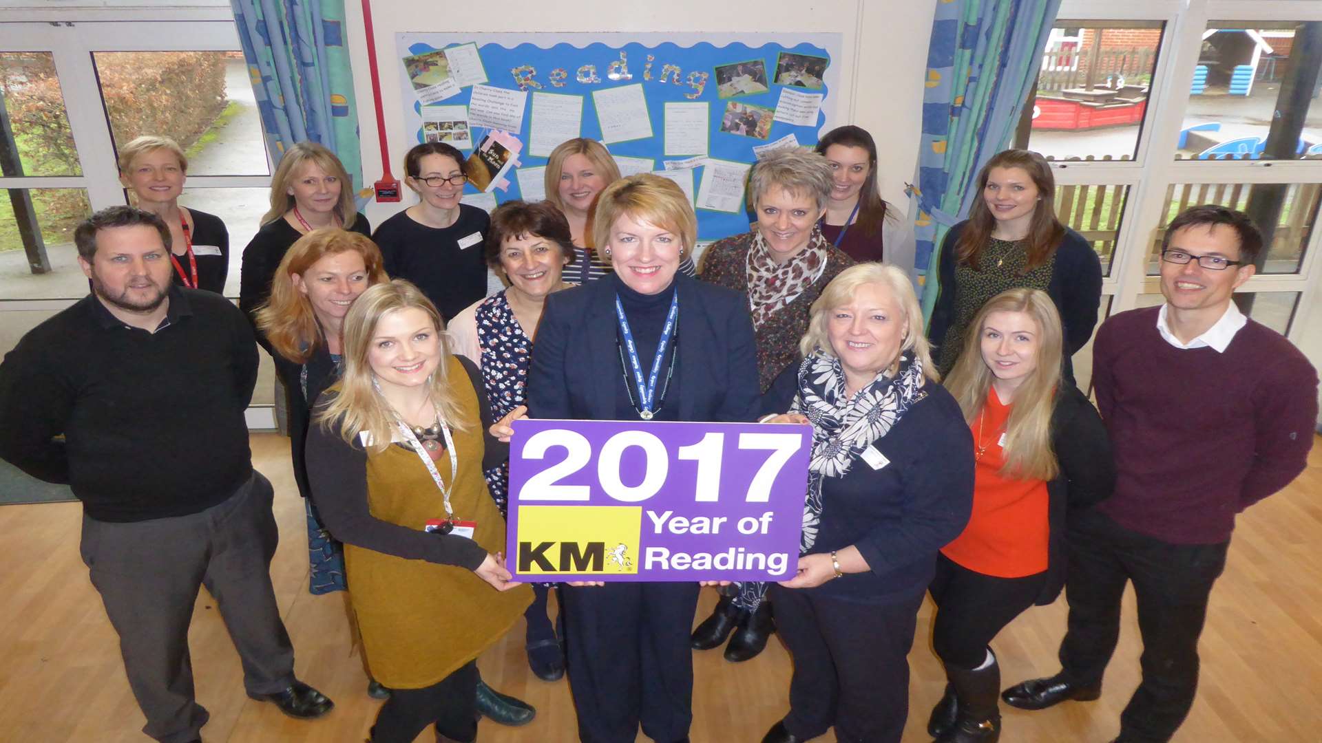 Mrs Ashley Crittenden, head teacher of West Borough Primary School (centre) joins Maidstone schools to launch KM's Year of Reading.