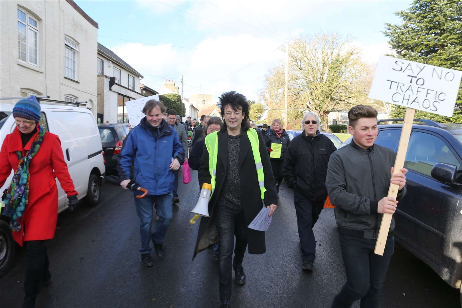 Cllr Mike Baldock with megaphone on a protest march against new houses. Picture: John Westhrop