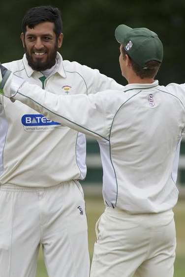 Lordswood bowler Adil Hussain celebrates with wicketkeeper Shaun Piesley after a Bromley wicket falls. Picture: Andy Payton