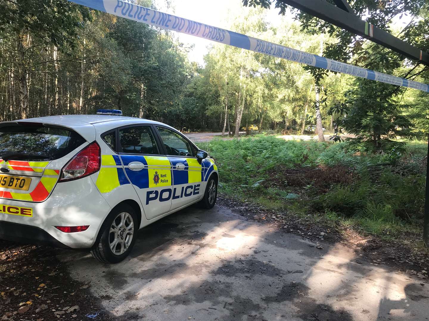Police cordoned off Clowes Wood this morning