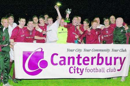 Canterbury City's players and management celebrate their Les Leckie Cup final win at Salters Lane
