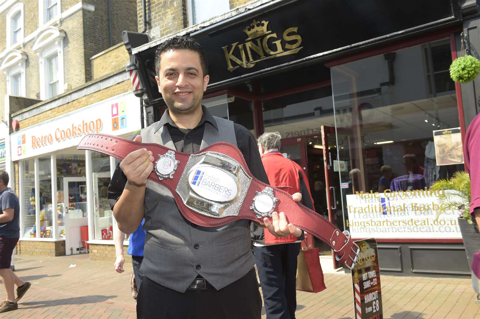 Efe outside his shop in Deal