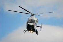 The air ambulance takes off from Rusthall Common after a woman suffered life-threatening burns