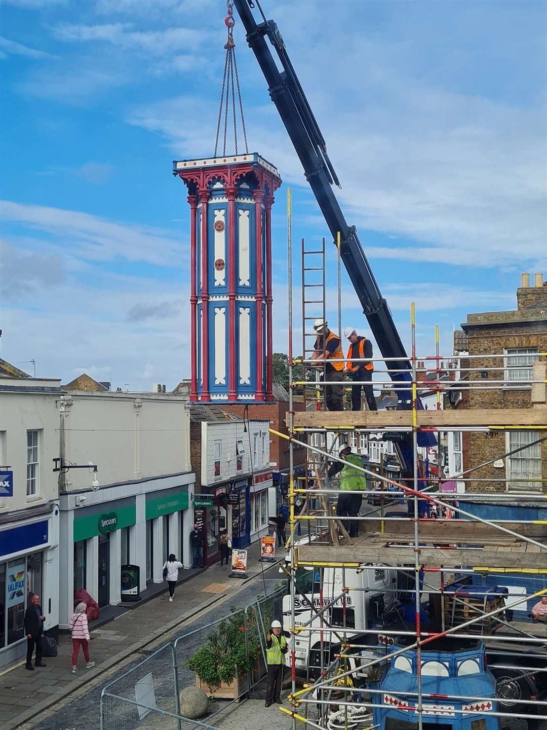 Time passes: Engineers from Smith of Derby use a crane to remove the 119-year-old Sheerness clock tower. Picture: Donna Mansi