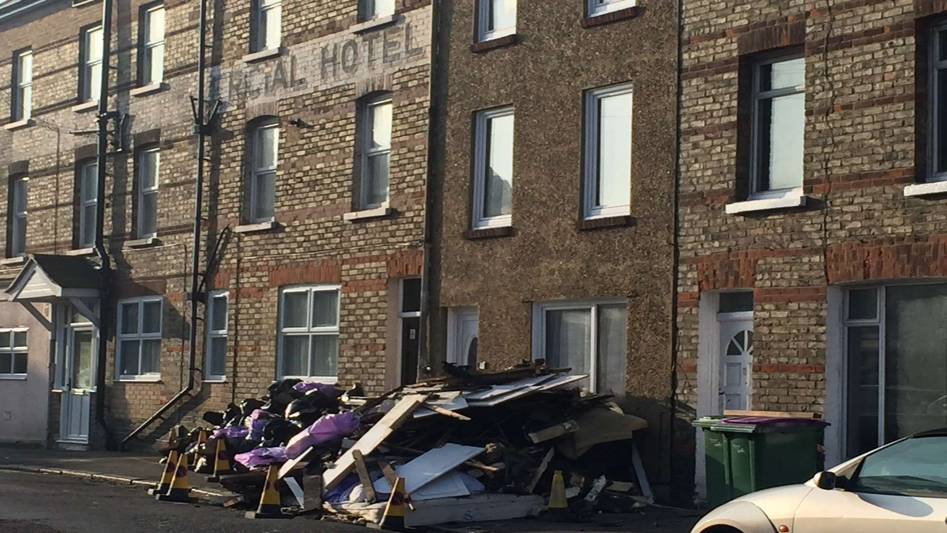 A pile of debris was stacked outside the property for most of the weekend