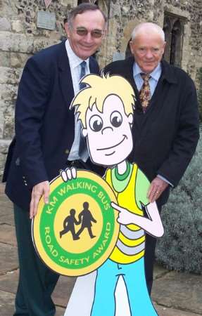 Picture: Brian Constable and Alan Harvey of The Co-operative Group with Jack, the Walking Bus charity's road safety character.