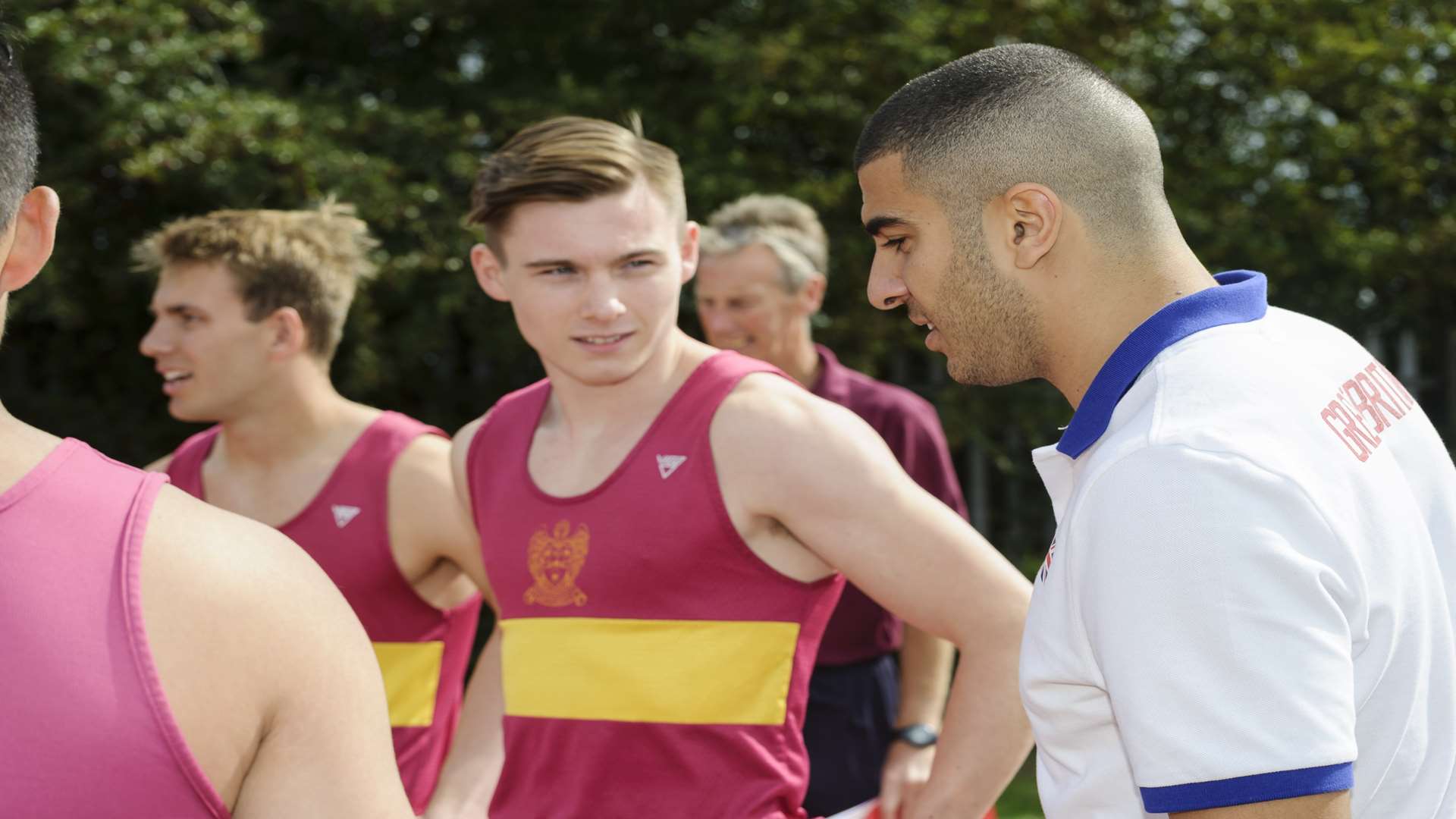 Adam Gemili talks to Year 13 pupils after running with them