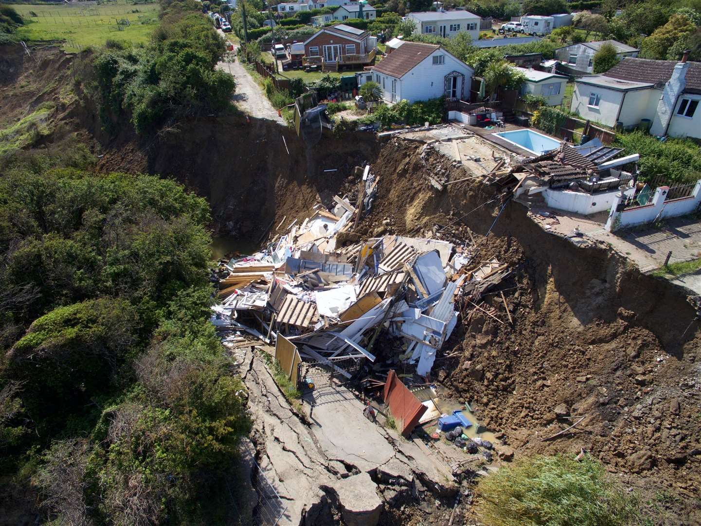 Aerial image of the house in Surf Crescent, Eastchurch, after it fell off the cliff. Picture: RLH Media