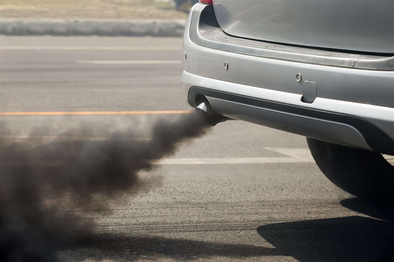 Dr Julian Spinks said people who walk or cycle along busy roads also suffer the effects of air pollution from the cars around them. Stock Image