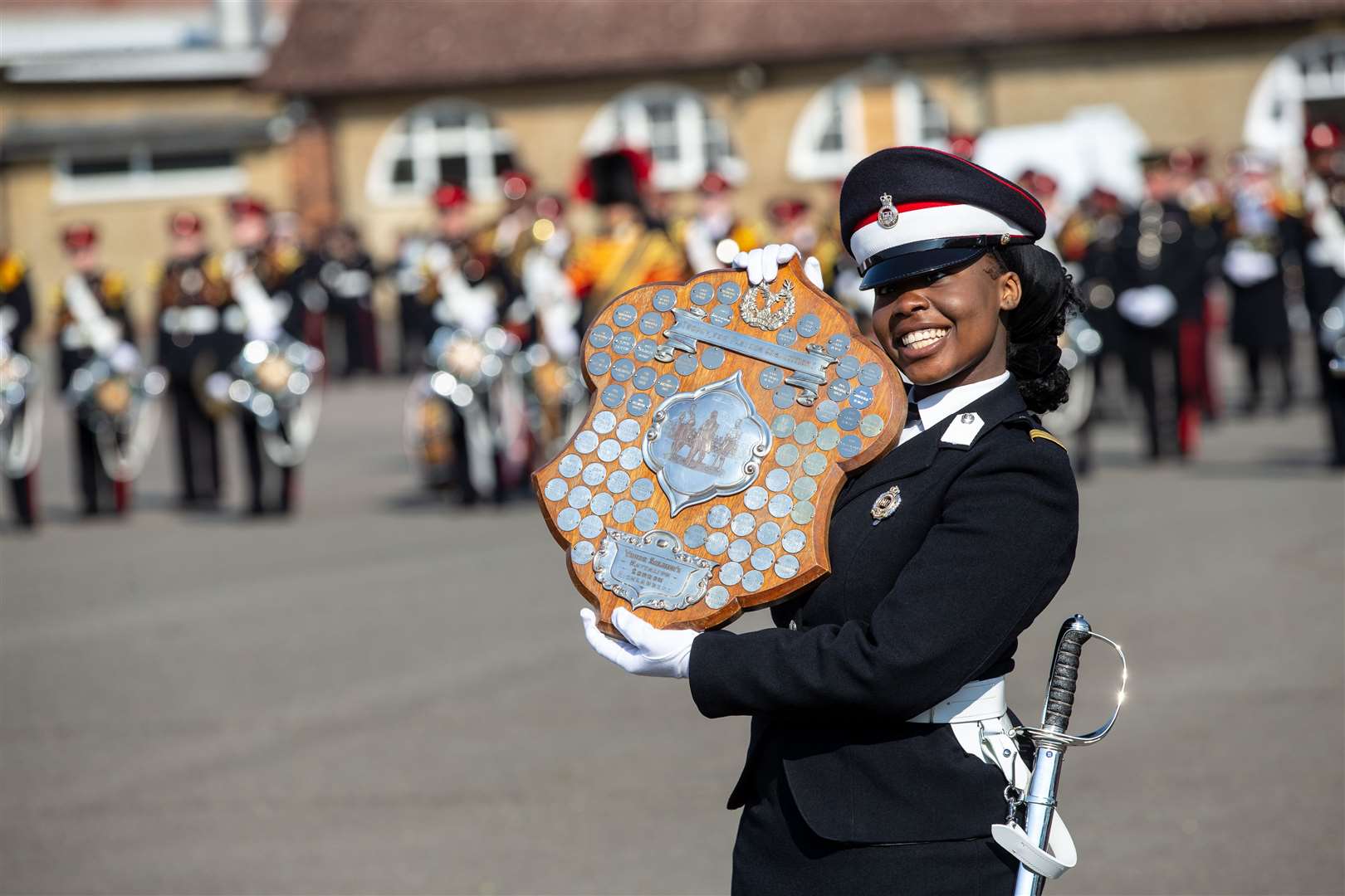 Jere Olawoyin, Junior Under Officer of Alanbrooke House, with the Drill Competition Shield. Photo by Matt Bristow/mattbristow.net