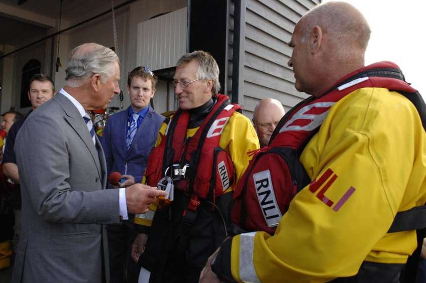 Prince Charles meets Whitstable lifeboat crew members Dave Parry and Richard Judge. Picture: Chris Davey