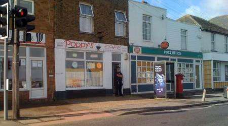 Police outside Poppy's Cafe in Halfway after a robbery
