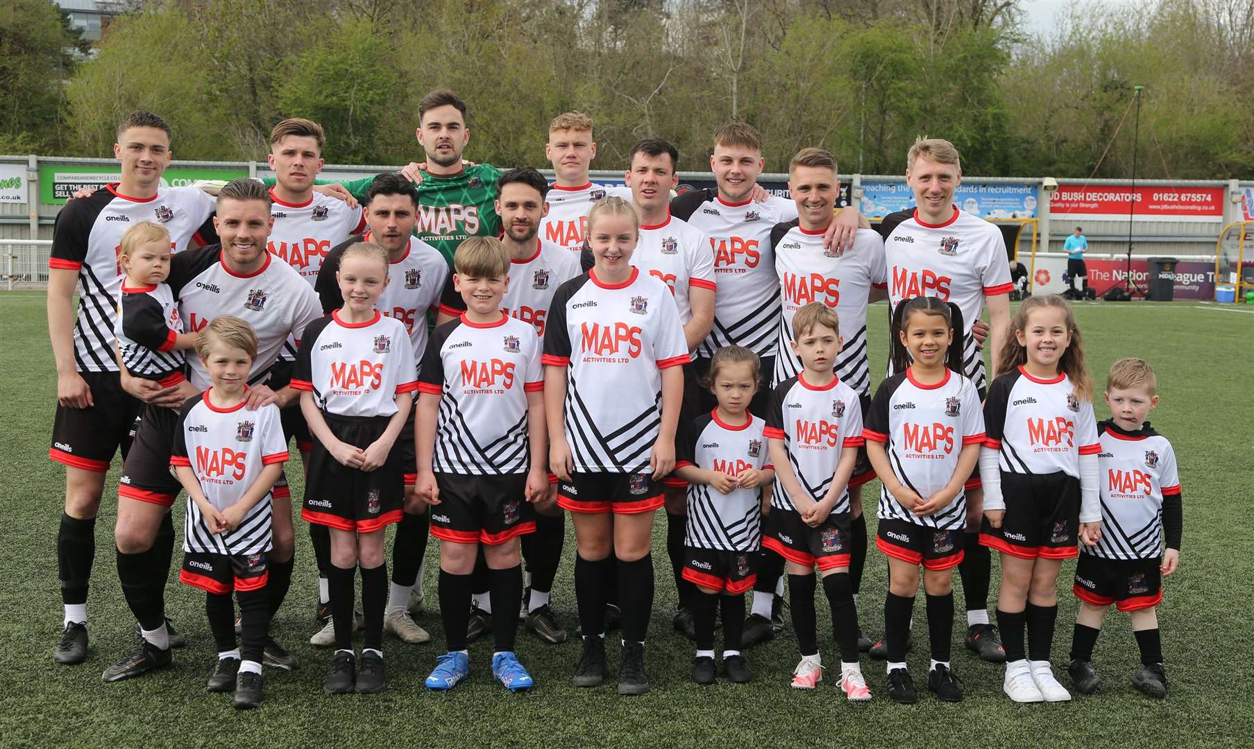 Runners-up Deal with their club mascots before kick-off. Picture: PSP Images