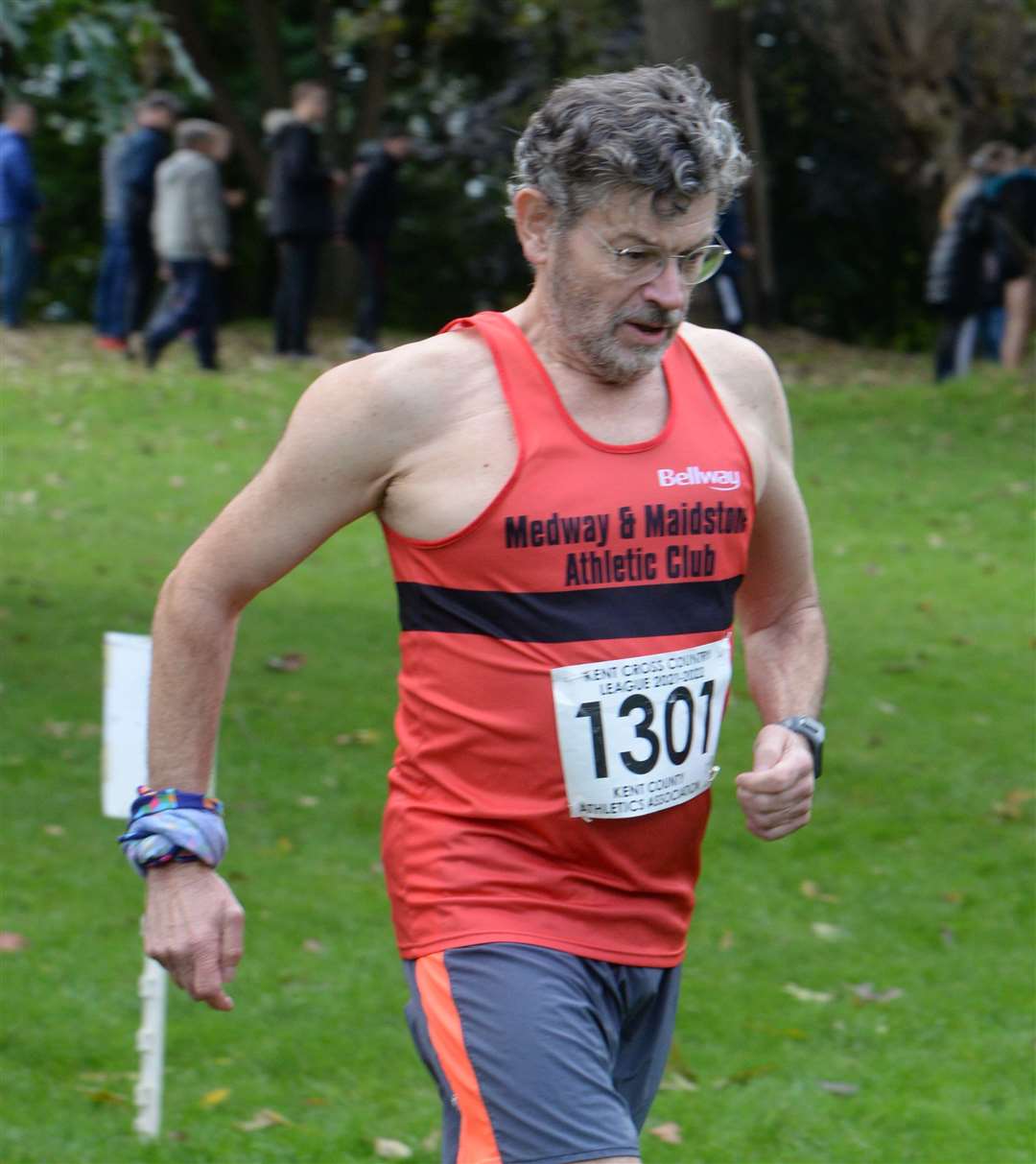 Nigel Read of Medway & Maidstone ups the pace in the men's vets 70 race. Picture: Chris Davey (52348053)