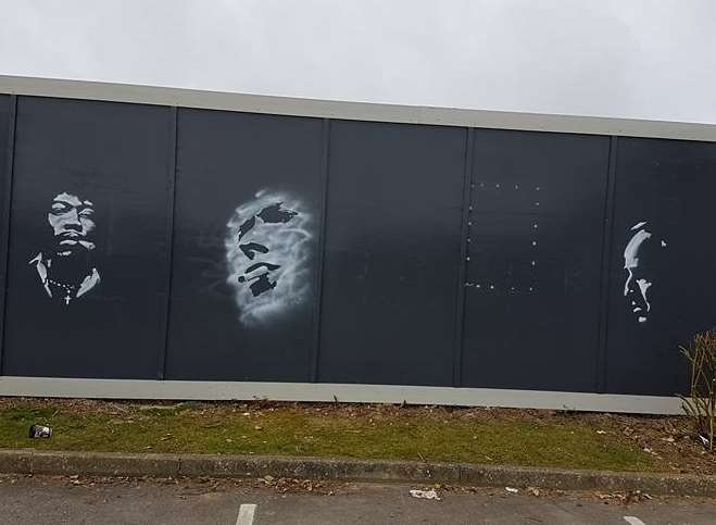 The stencils of legends appeared on the hoardings on Saturday night. Picture: Jackie Ide