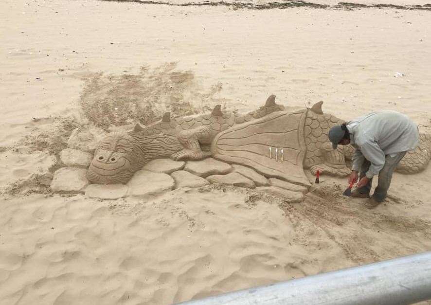 The sand sculpture dragon appeared on the beach at Westbrook Bay in Margate. Picture: Liz James