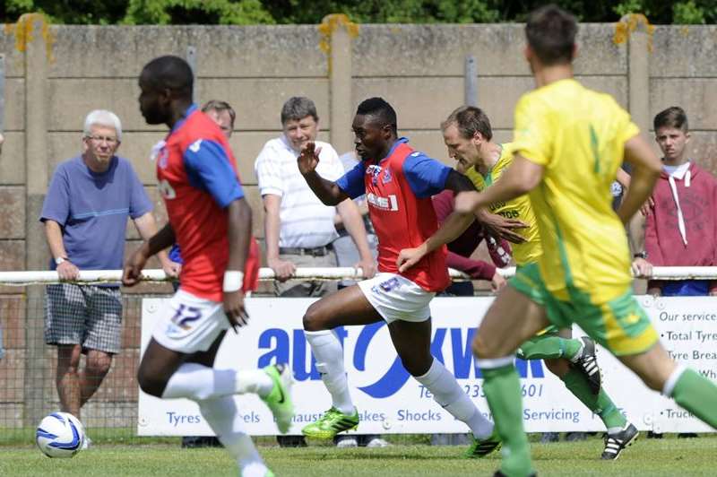 Gillingham midfielder Amine Linganzi on the attack against Ashford United at Homelands on Saturday. Picture: Barry Goodwin