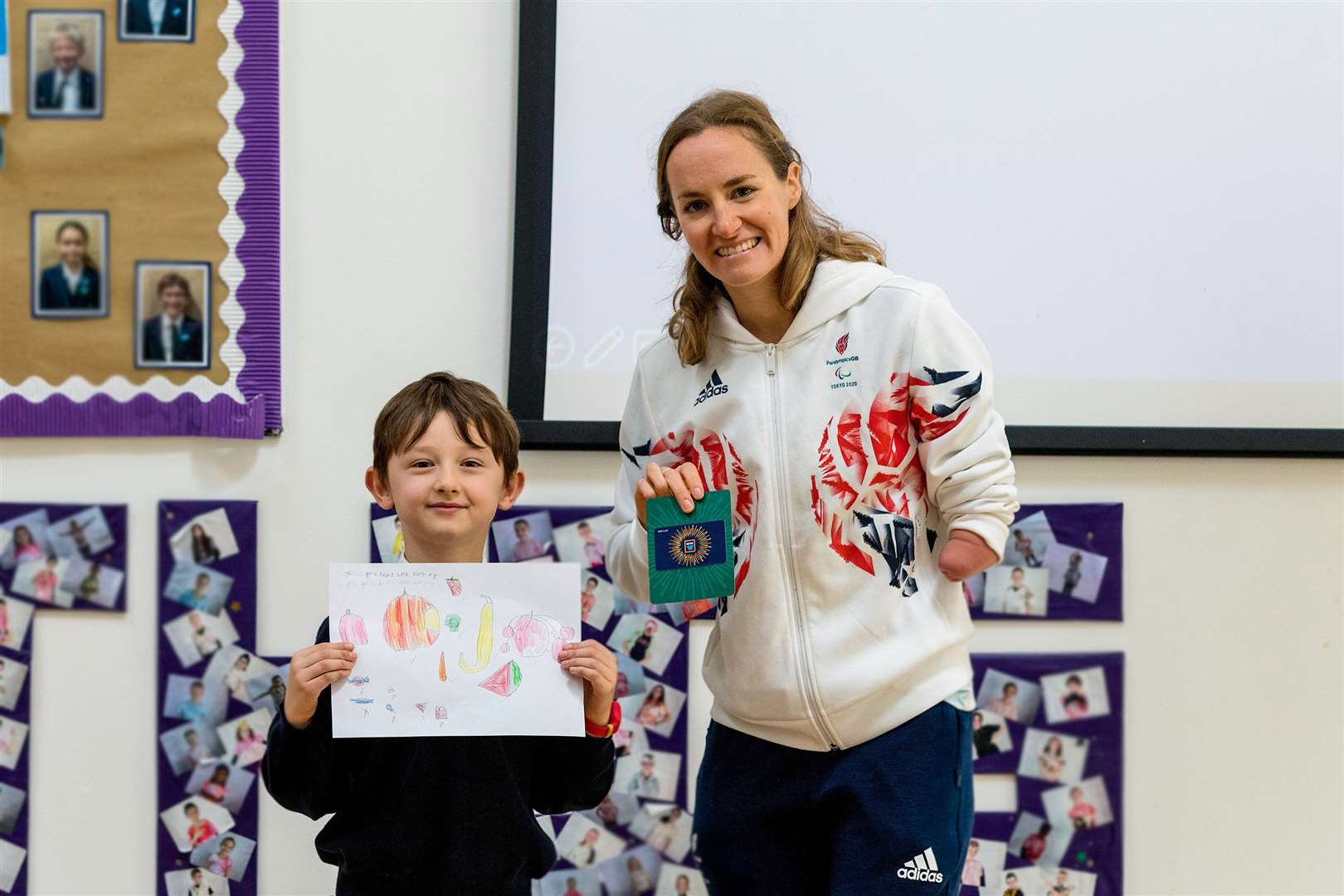 Paralympics GB athlete Claire Cashmore with poster prize winner at Valley Invicta Primary School. Picture: McCann