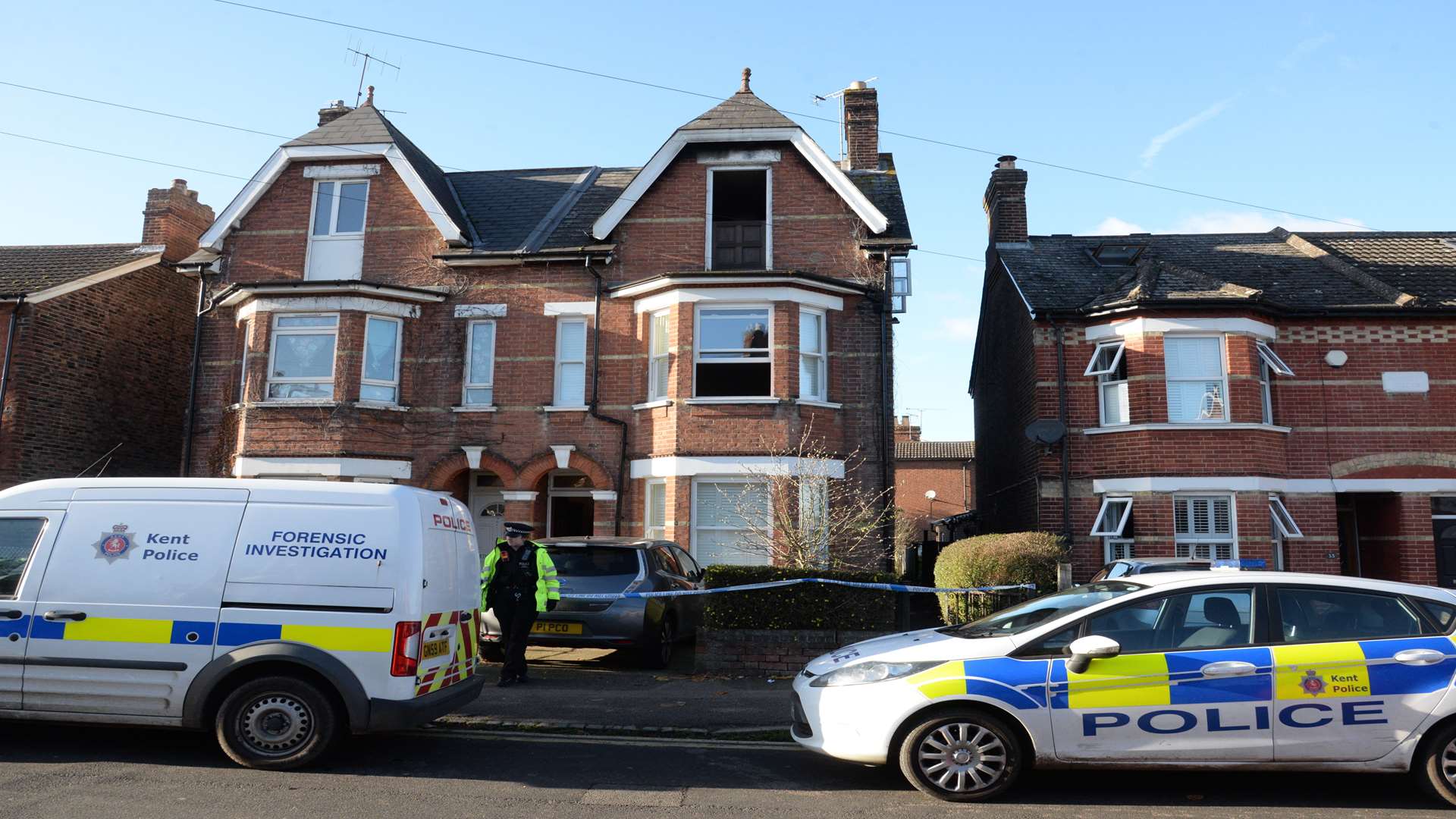 Police and fire service investigators in St Mary's Road, Tonbridge