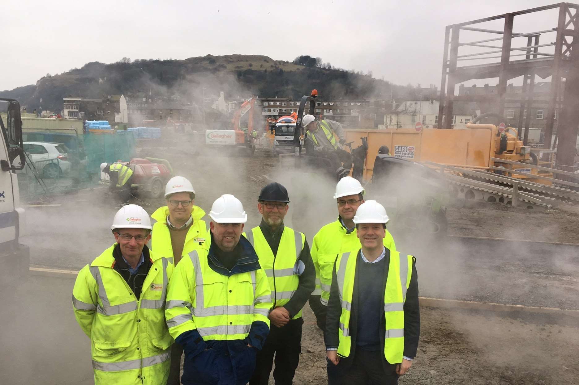 MP Charlie Elphicke with staff from Dover District Council at Dover's St James' development site in February.