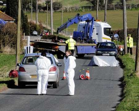 Crash investigation officers at the scene of the fatal smash at Woodnesborough