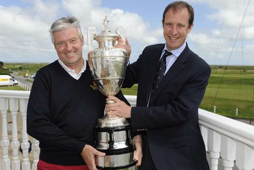 Royal Cinque Ports’ professionsl golfer Andrew Reynolds and secretary Martin Bond with the Amateur Championship Trophy