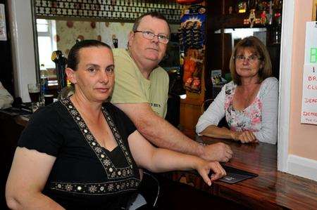 Lee and Joy Ewart with manager Lynne Marchington at Rushenden Club where the charity box was stolen from