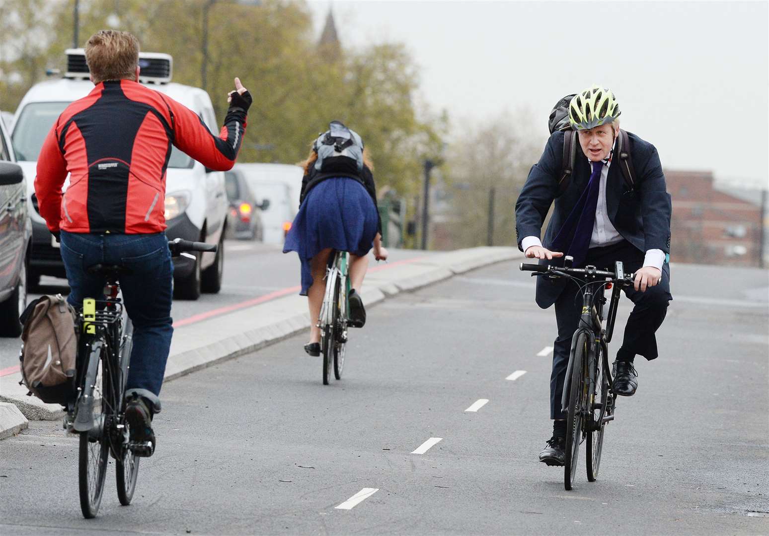 A fellow commuter gesturing to Mr Johnson during his tenure as Mayor of London (John Stillwell/PA)