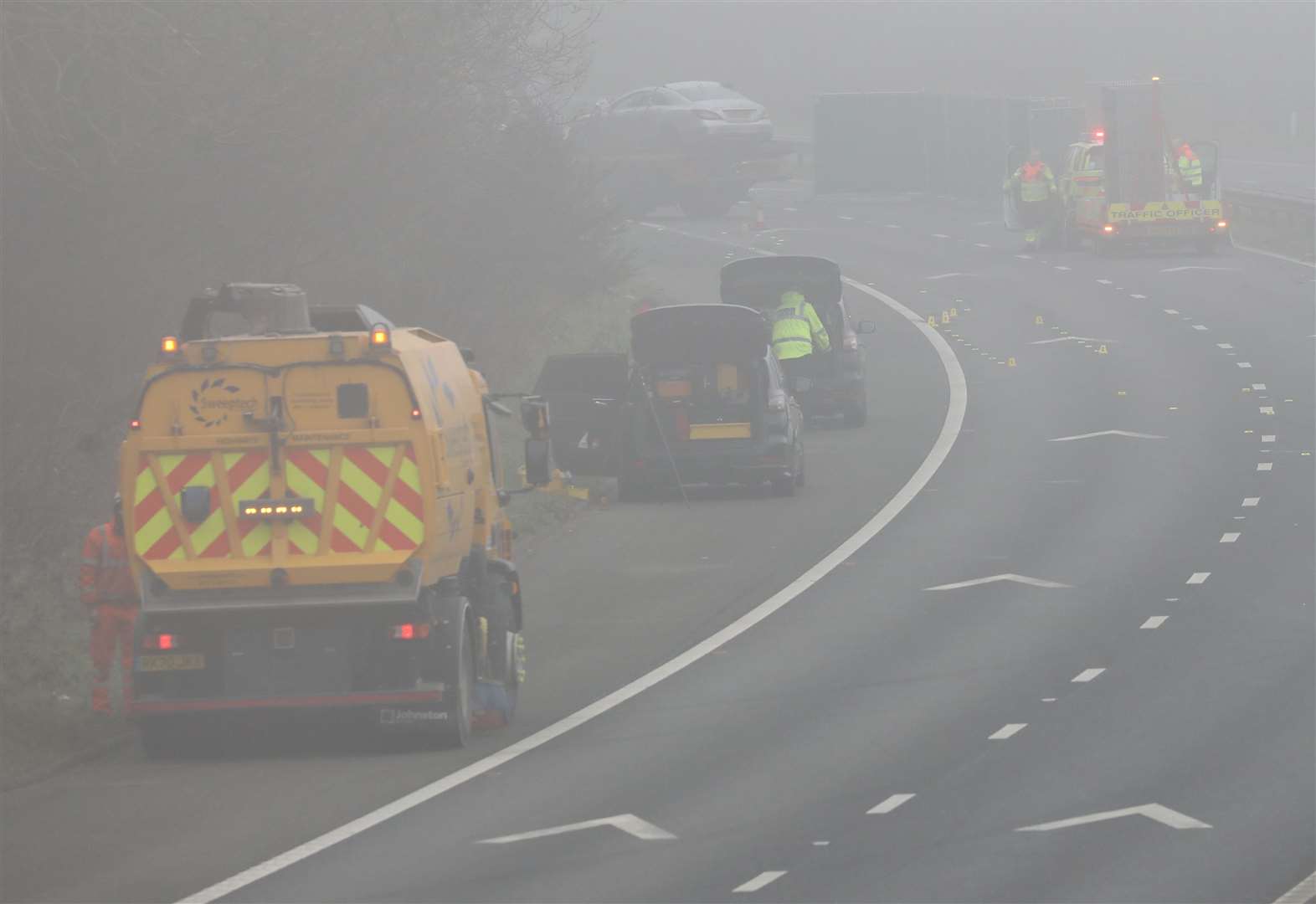 Crash investigators on the M2 this morning. Picture: UKNiP