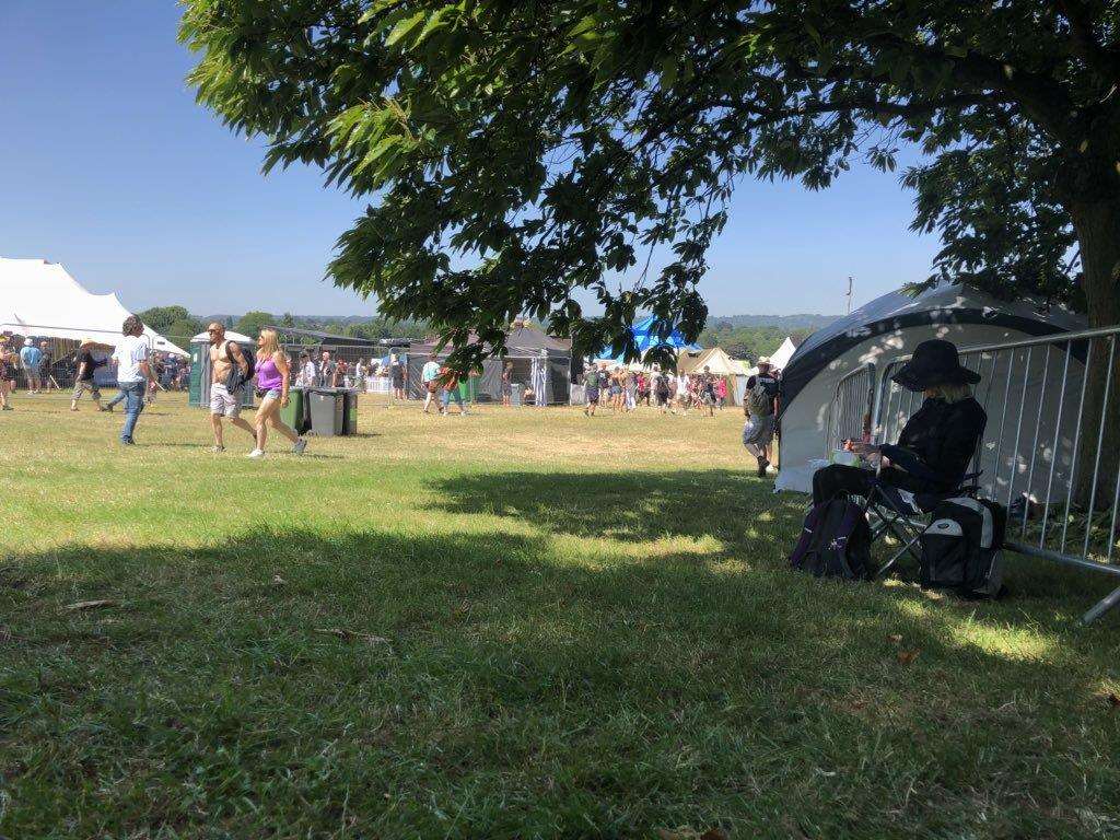 Welcome shade from the 23C heat at the Ramblin Man Fair, Maidstone on Saturday. Picture: Poppy Jeffery (2803724)