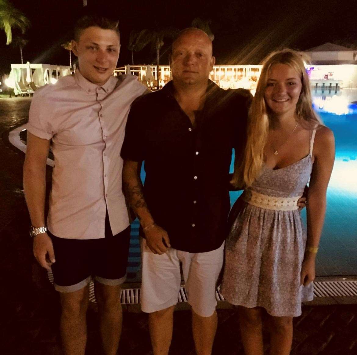 From left: Kieran, dad Jonathan and sister Maisie. Picture: Charlotte Ingram