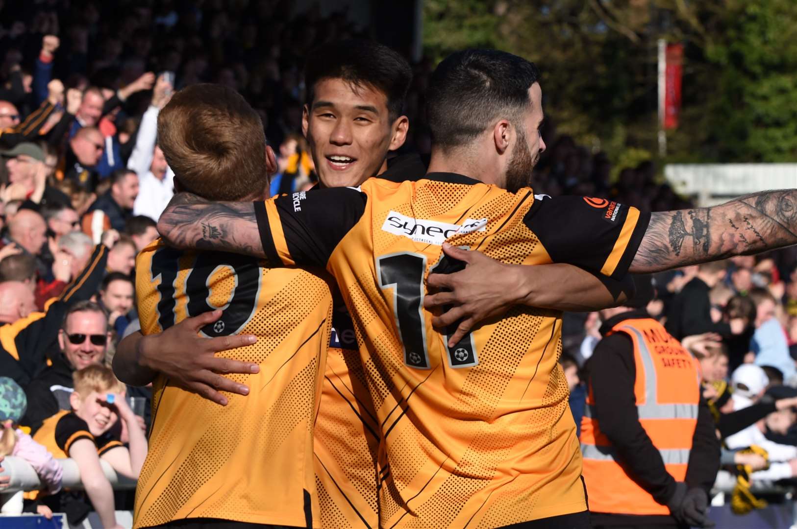 Bivesh Gurung, centre, celebrates with Jack Barham and Joan Luque after coming off the bench against Havant last weekend Picture: Steve Terrell