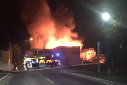 Flames were seen shooting up from the chaplaincy building. Picture: Kirsty Gilling