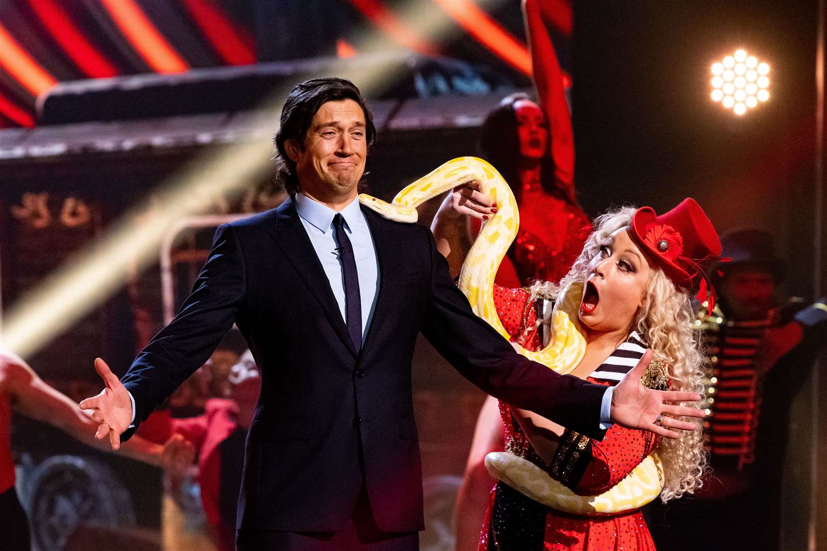 Former I'm A Celeb star Vernon Kay is given a fright by Danielle Martin, who works at a Dartford care home, and her 7ft albino Burmese python. Picture: Thames/ITV