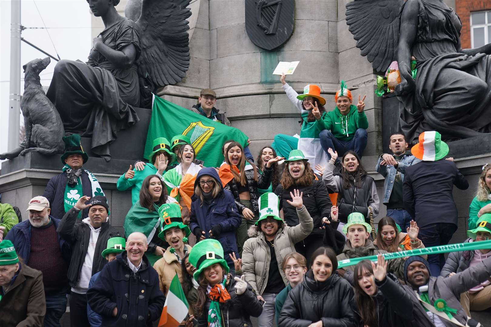 People gather at the Daniel O’Connell monument (Brian Lawless/PA)