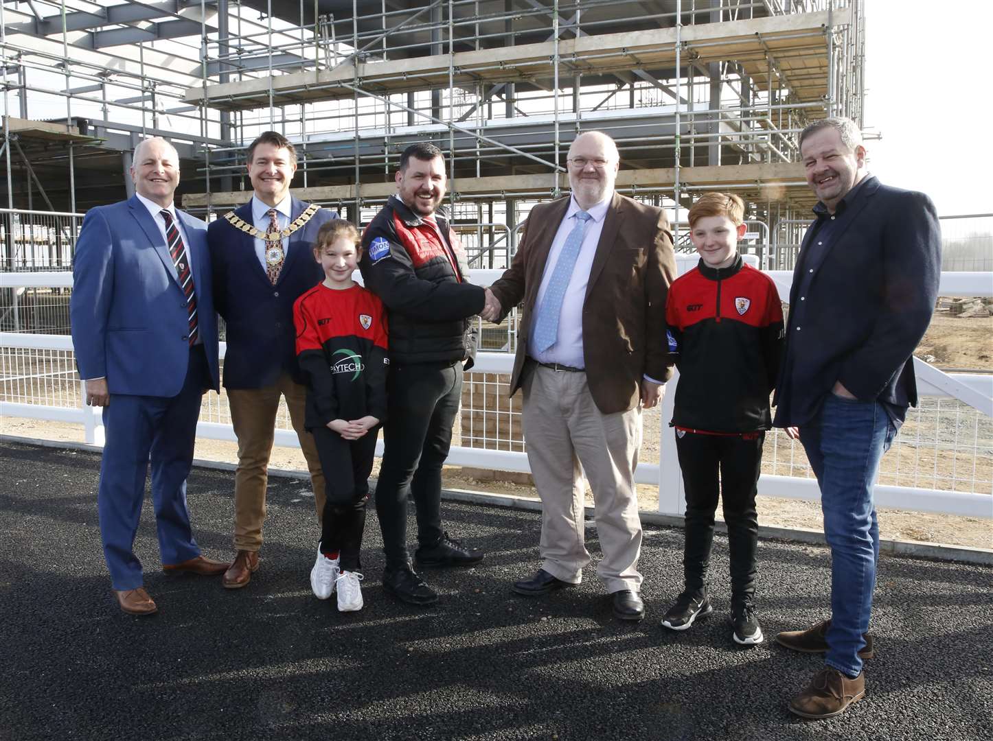 From left to right: former chairman Stephen Tite, Dartford mayor David Mote, current rugby club chairman Peter Timon, council leader Jeremy Kite and deputy leader Chris Shippam, with youngsters Eva and Oliver. Picture: Dartford council (7441864)