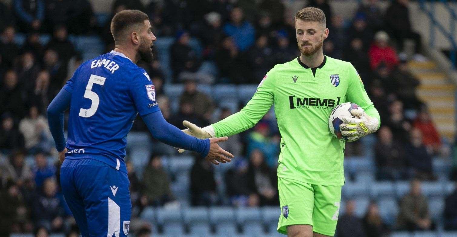 Max Ehmer and goalkeeper Jake Turner high five in Gillingham's weekend 3-0 loss to Salford