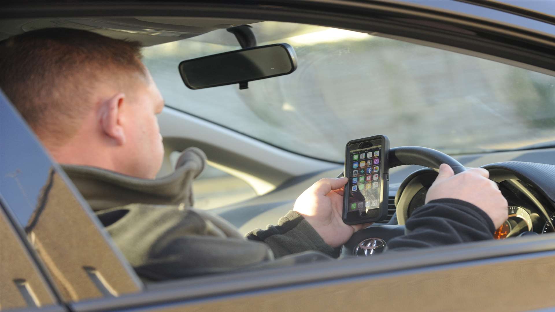Fewer drivers are being caught using mobiles at the wheel in Kent. Stock image