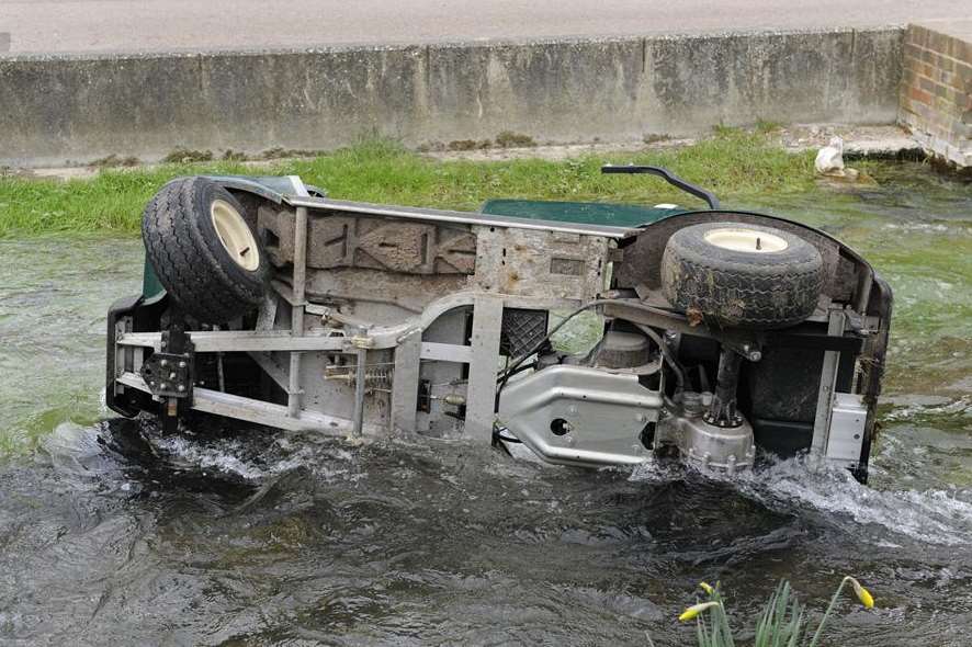 The overturned golf cart discovered in the Nailbourne