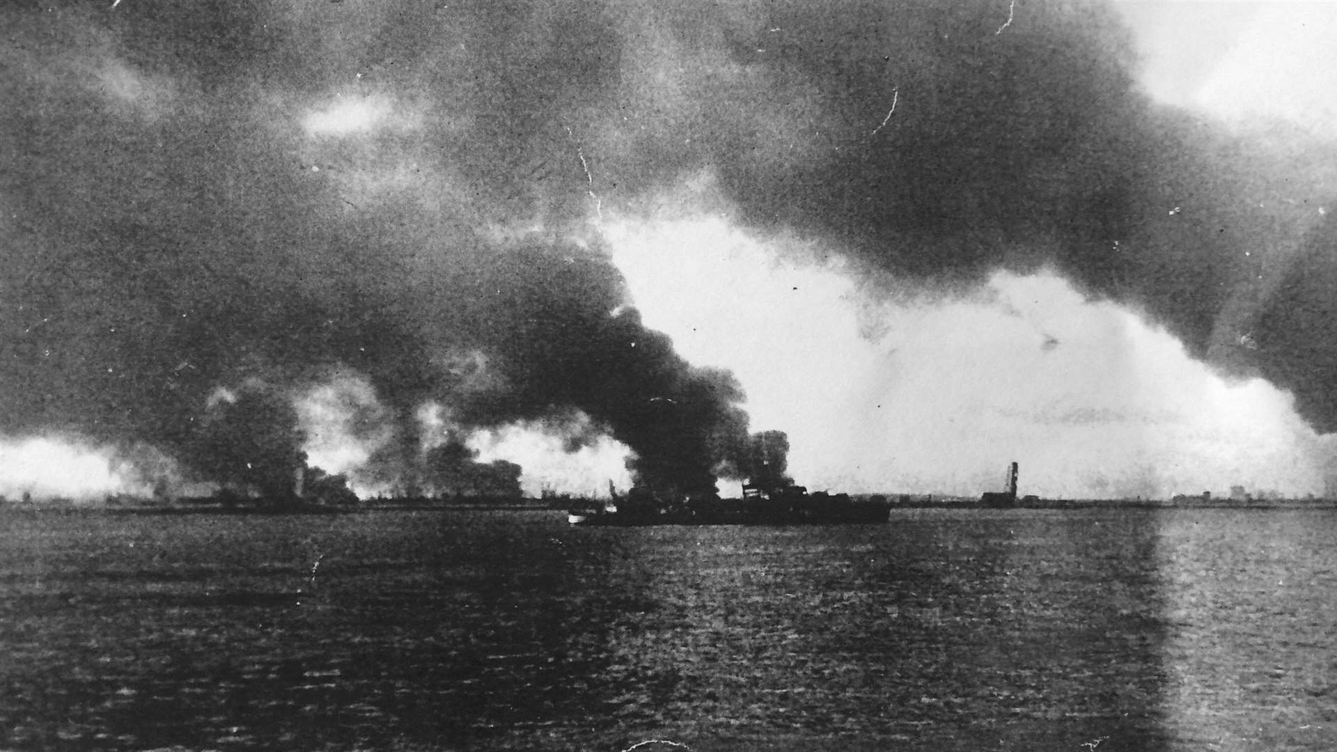 Ships on fire at Dunkirk, 1940