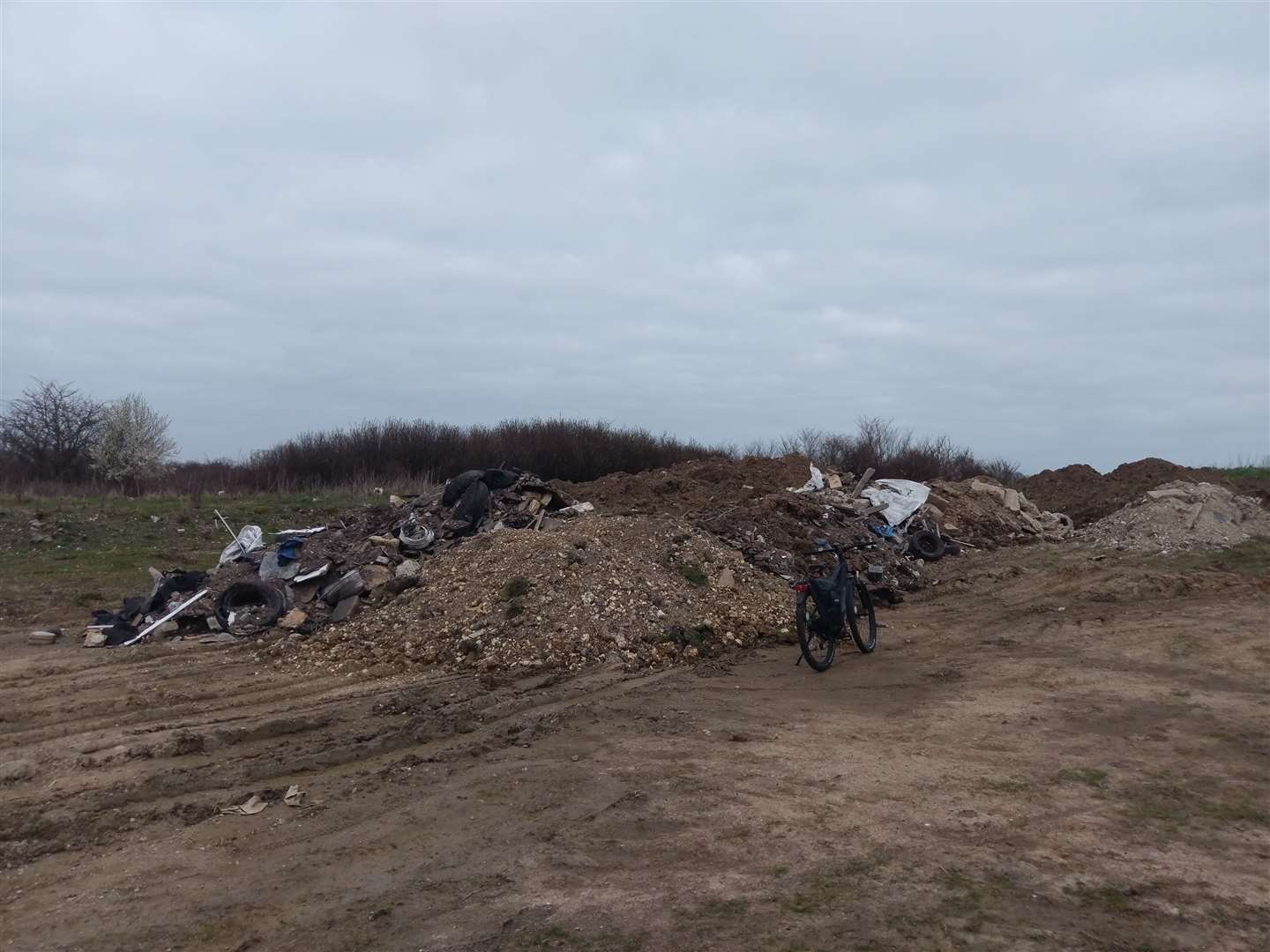 Mounds of construction, thought to weigh hundreds of tons, has been dumped on land at Hillborough