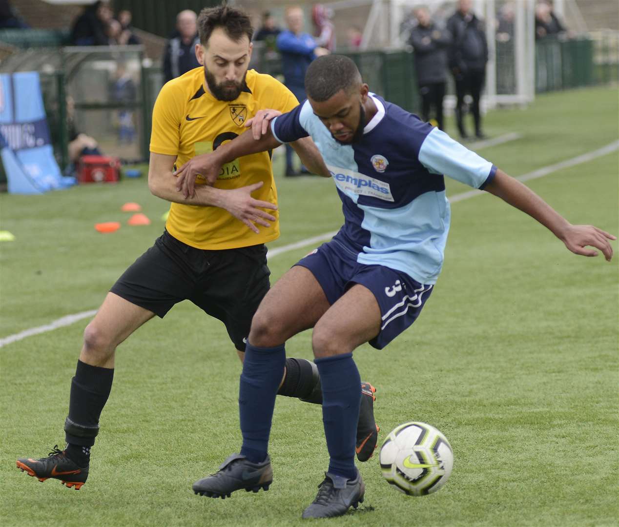 Kennington's Sam Conlon, left, looks to hold off Croydon in the Southern Counties East League game at Homelands a week earlier Picture: Paul Amos