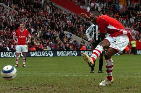 Darren Bent scores from the spot against Newcastle on Sunday. Picture: MATTHEW WALKER