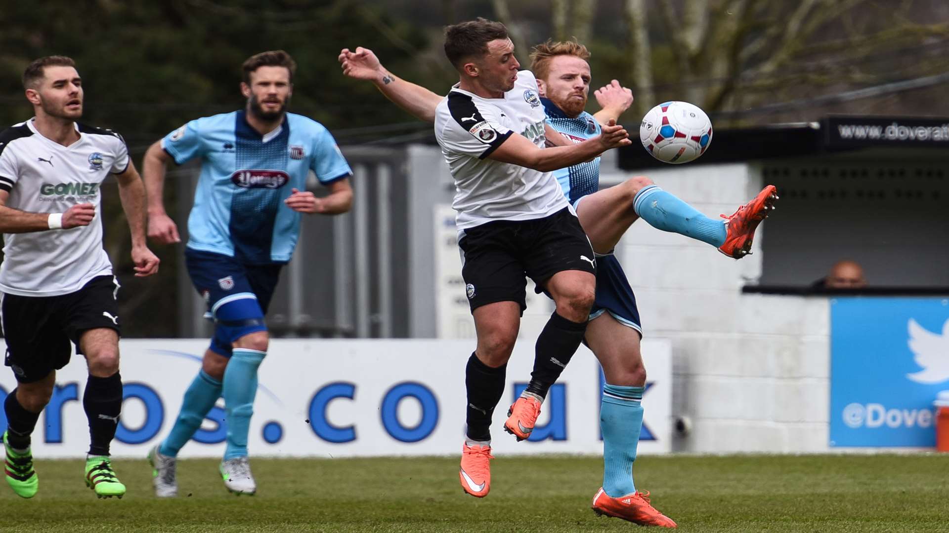 Ricky MIller battles for possession against Grimsby. Picture: Alan Langley