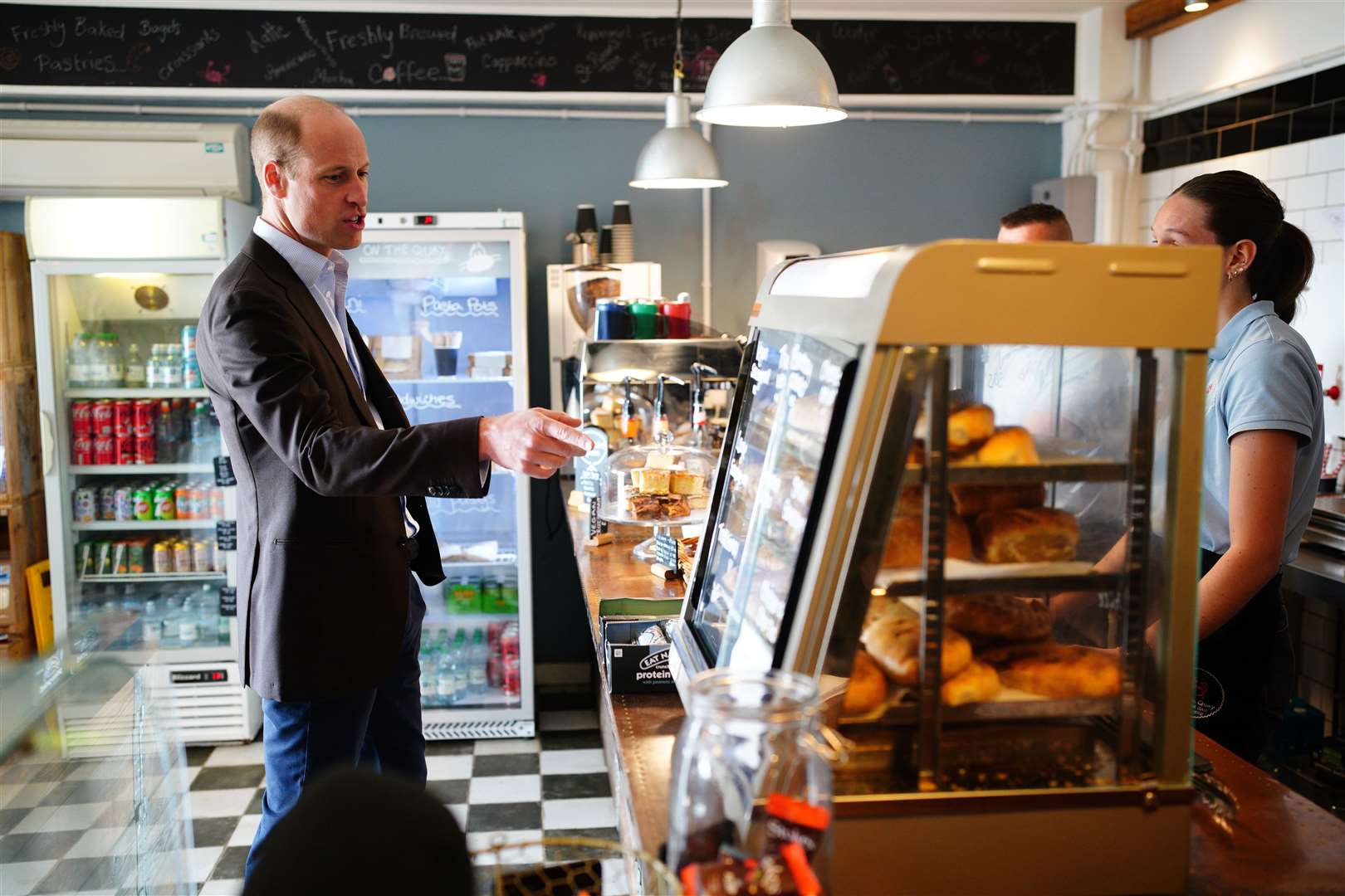 William order five pasties from the On The Quay cafe (Ben Birchall/PA)