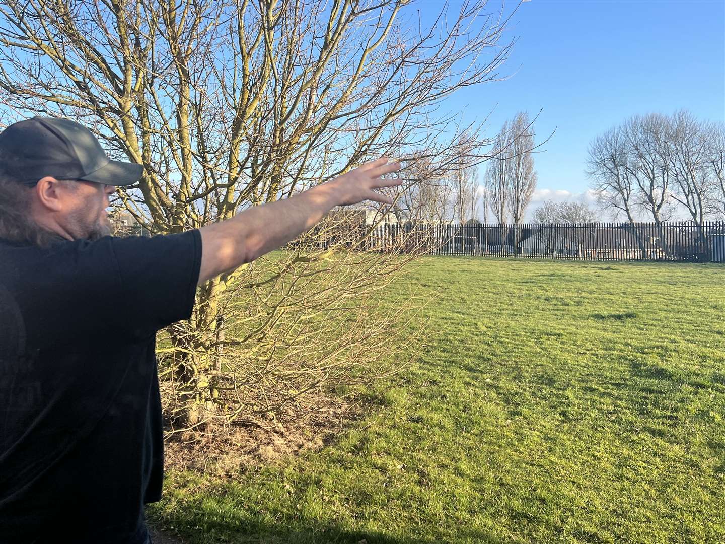 Kelly Downes, of Dunlin Walk, pointing at where the new houses might go. Picture: Megan Carr