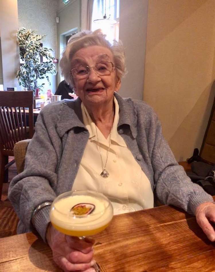 Hilda Luck enjoying a cocktail on her 108th birthday. Photo credit: Ronnie Luck
