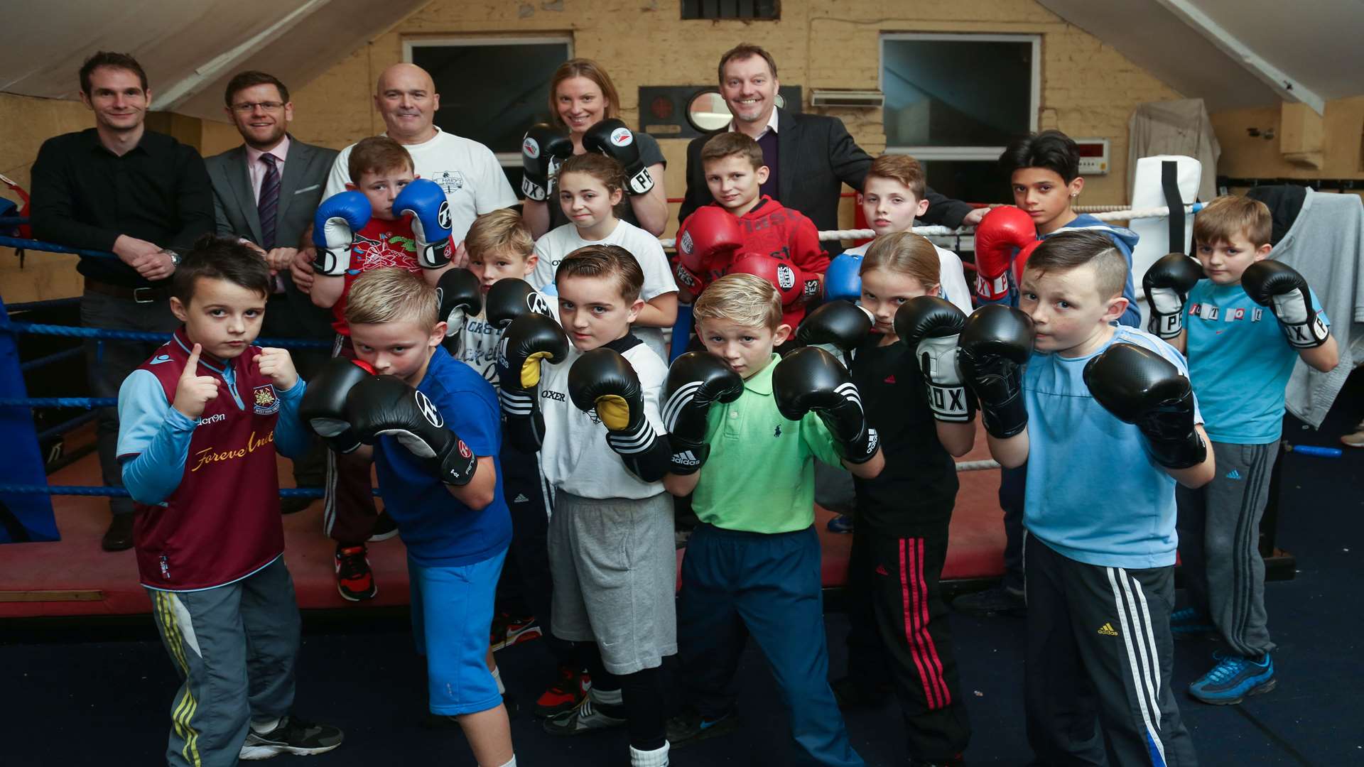Young boxers at St Mary's Boxing Club in Street End Road with MP Tracey Crouch