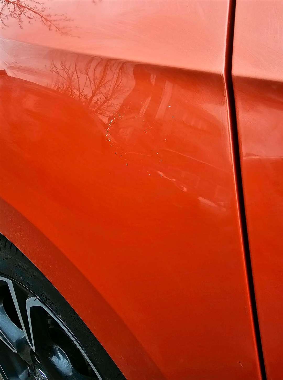 Sian's orange Vauxhall Corsa was damaged on Ingress Park Avenue